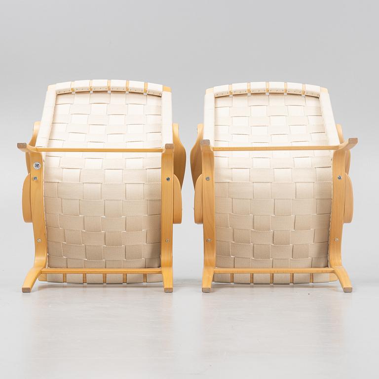 Bruno Mathsson, a pair of 'Eva' armchairs, Bruno Mathsson International, Värnamo, Sweden 2004.