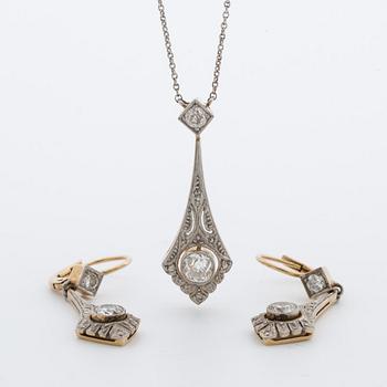 A pendant with a pair off earrings with old-cut diamonds ca 1.10 cts. 1920.
