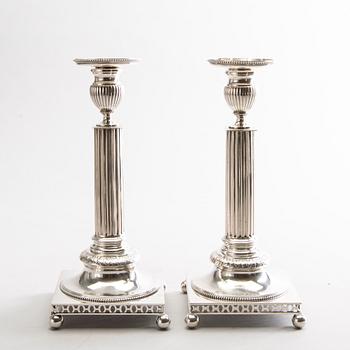 GUSTAF MÖLLENBORG, a pair of silver candlesticks 1902-1903 Stockholm.