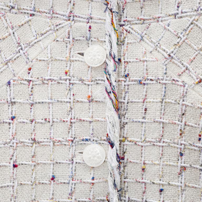 Chanel, a white bouclé jacket, size 34.