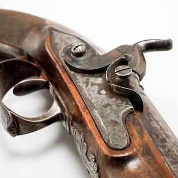 A pair of percussion guns, around the mid 19th century.