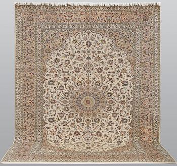 A Keshan carpet, approx. 398 x 295 cm.