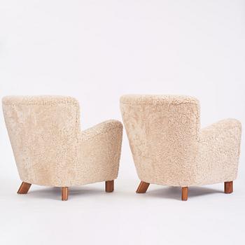 Fritz Hansen, a pair of easy chairs model '1669', Denmark 1940-50s.