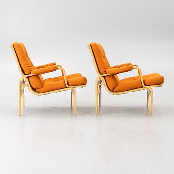 Bruno Mathsson, a pair of 'Ingrid' armchairs, Dux.