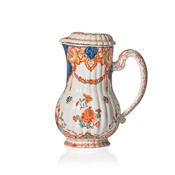 A Dutch Delft polychrome faience ewer, early 18th Century.