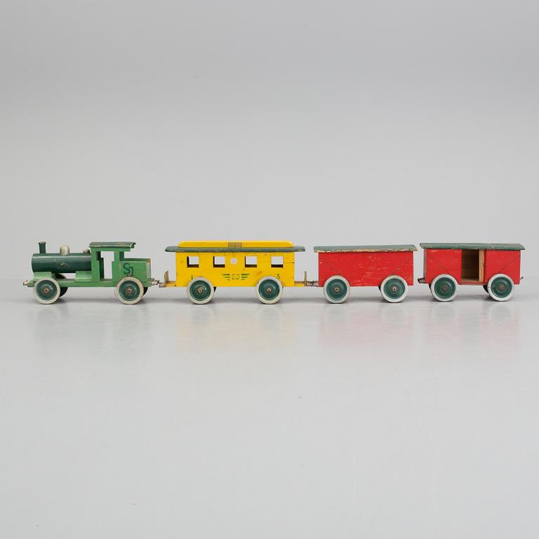 A set of four pieces wooden toy train.