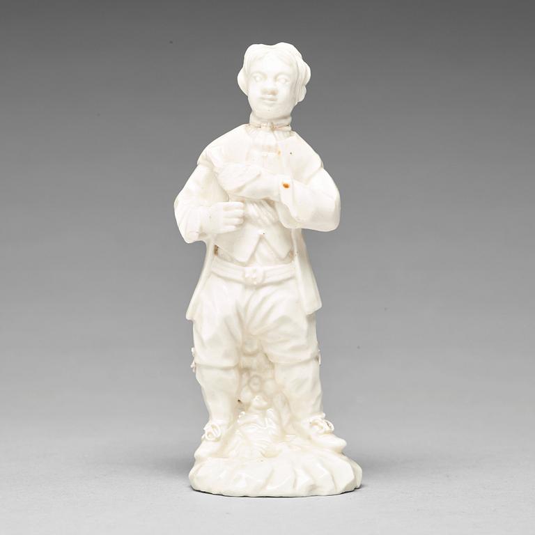 A Swedish Marieberg soft paste figure of a man with a bird, 18th Century.