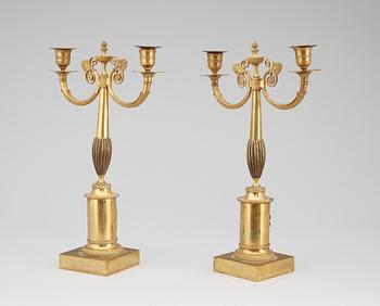 A pair of Swedish Empire 19th century gilt bronze two-light candelabra.