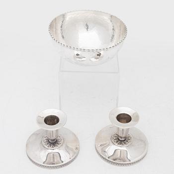 A pair of Swedish silver candlesticks, and a bowl, 1930s–60s.