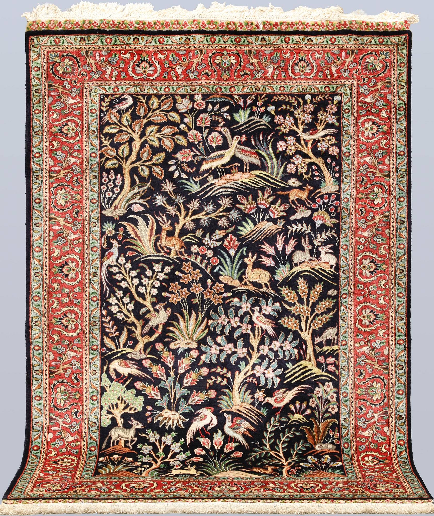 A Tabriz silk rug, approx. 155 x 100 cm.