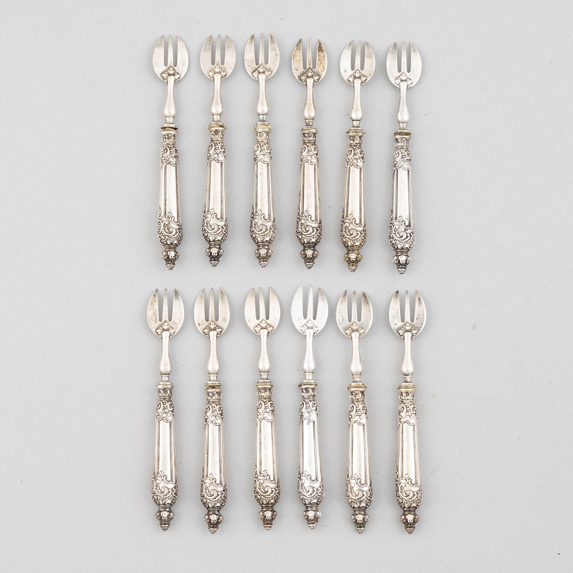 Twelve French Silver Oyster Forks, mark of Louis Coignet, Paris 1889-93.
