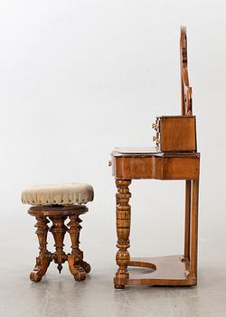 A second half of the 19th century table with mirror and a stool.