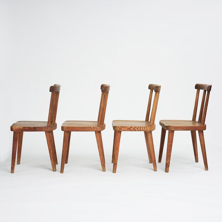 Axel Einar Hjorth, a set of four stained pine "Utö" chairs, Nordiska Kompaniet, Sweden 1930s.