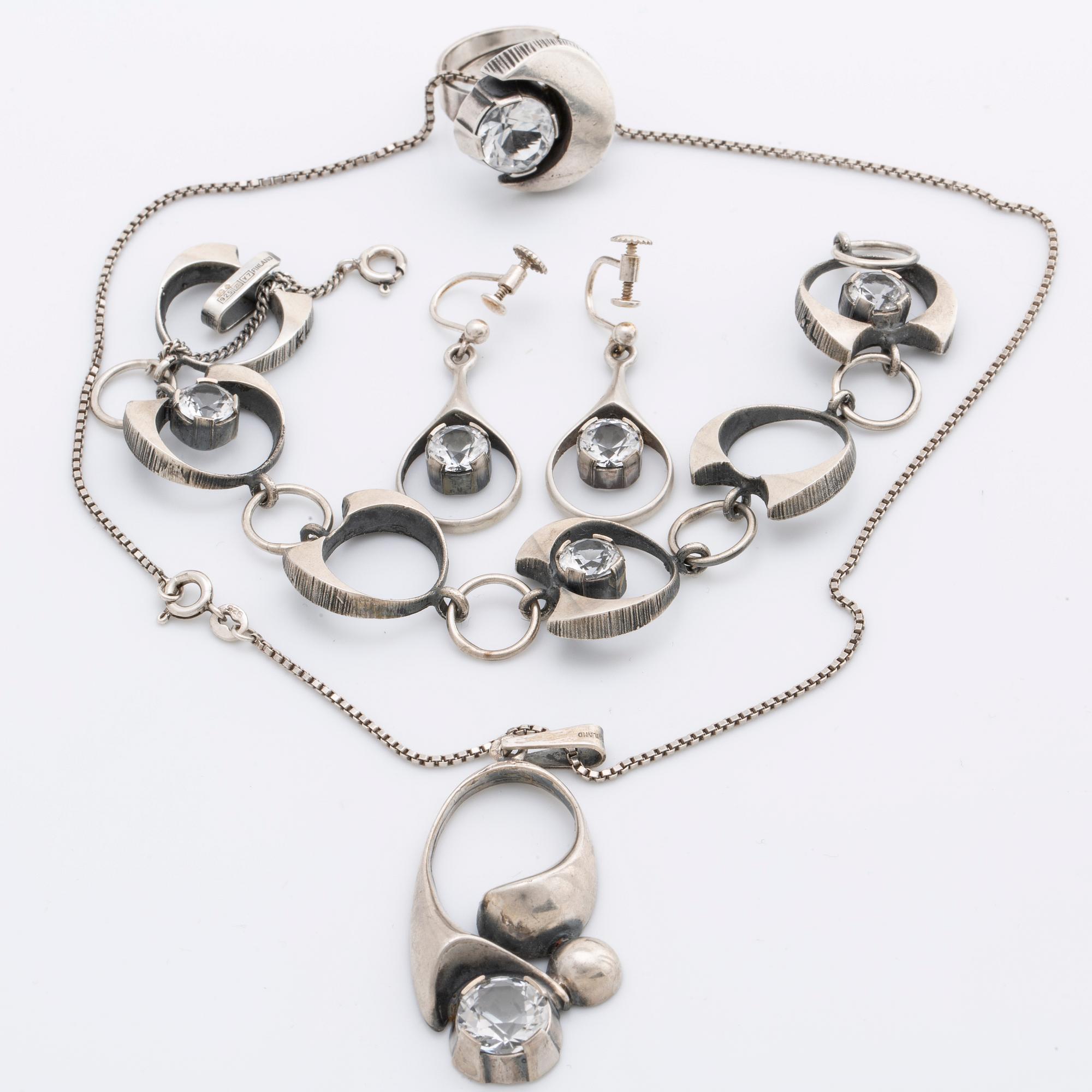 KARL LAINE, silver jewelry, 4 pieces with rock crystal, Finland, 1970s.