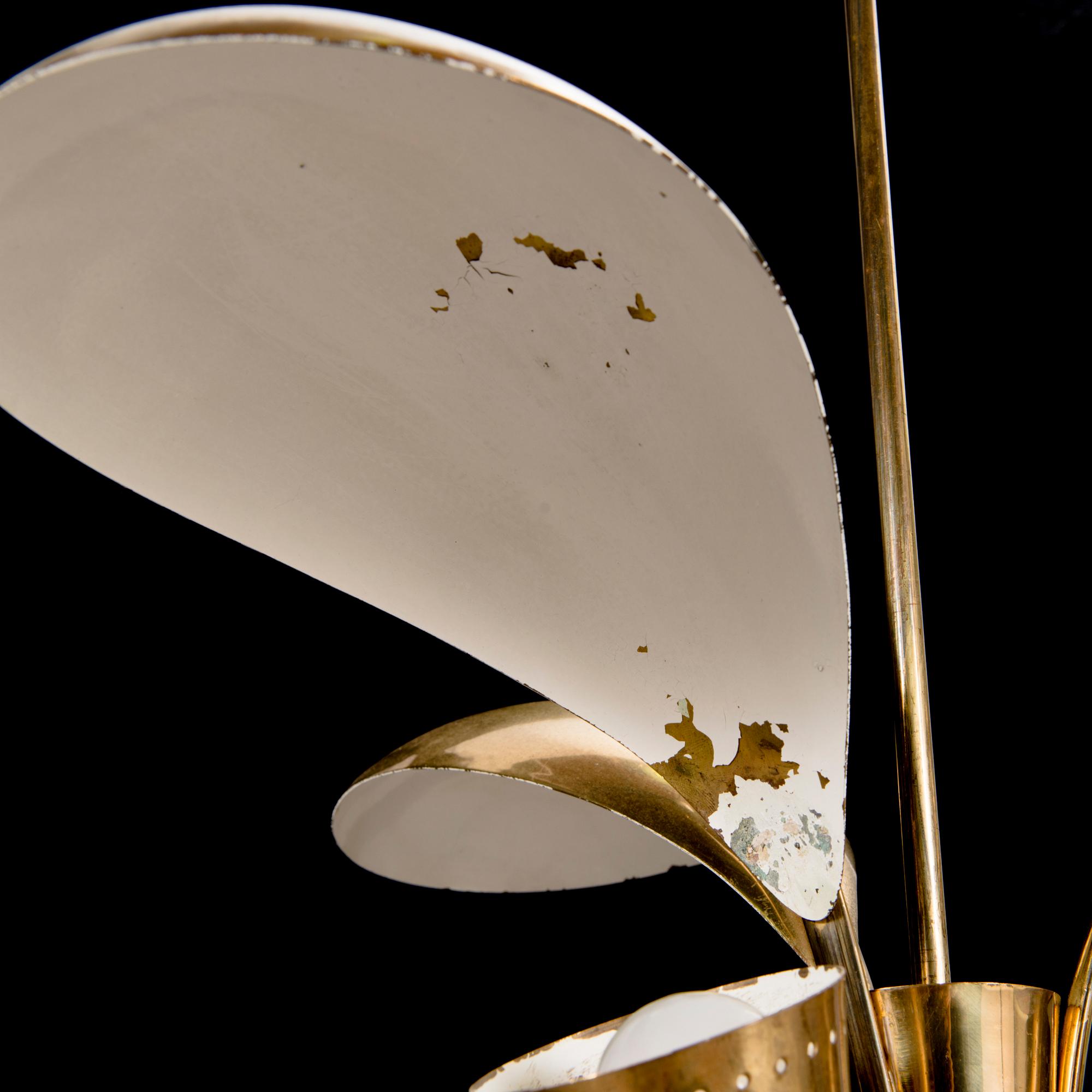 A 1950s brass pendant ceiling light model '2542/3' for Valinte, Finland.