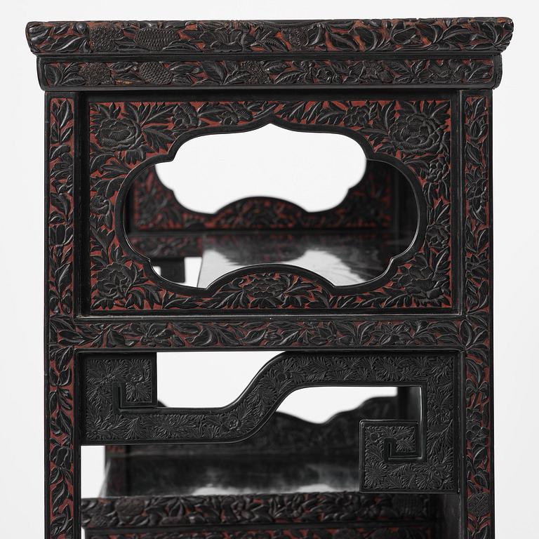 A lacquer display cabinet, late 19th century.