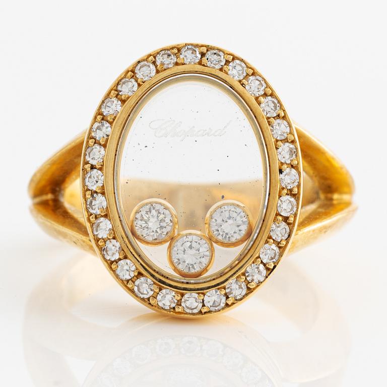 Chopard ring 18K gold with round brilliant cut diamonds.