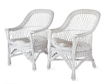196. A PAIR OF WHITE WICKER ARMCHAIRS,