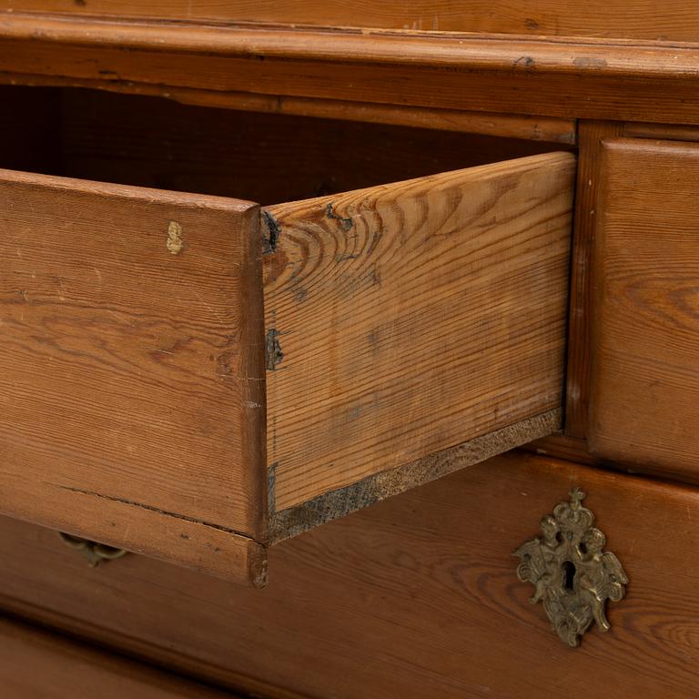 An 18th two-part pine century cabinet.