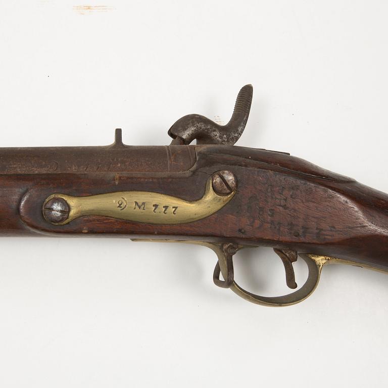 A 18th Century Swedish-British converted percussion gun.