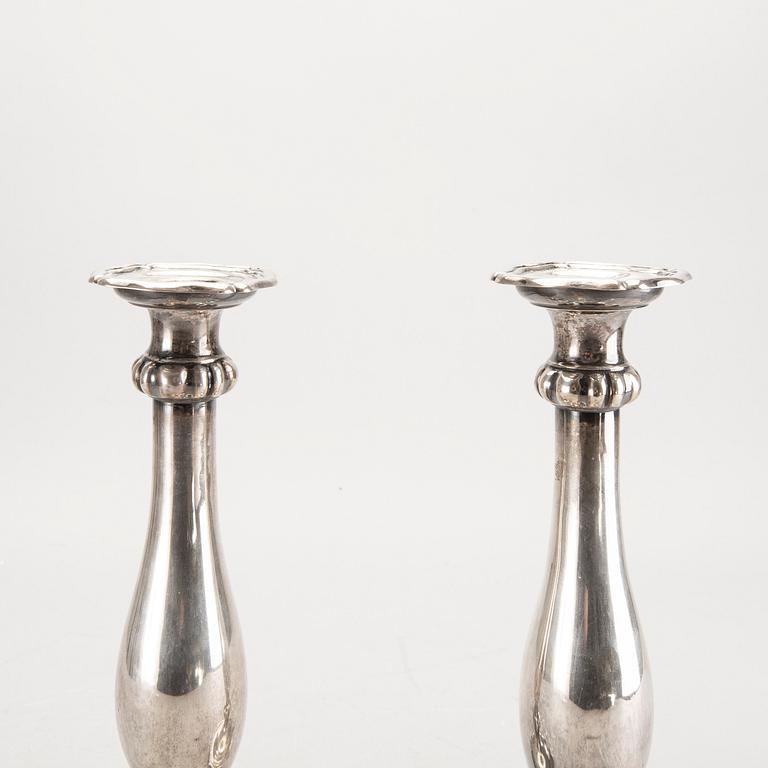 A pair of Austrian silver candle sticks Vienna 1852 weight 626 gr.