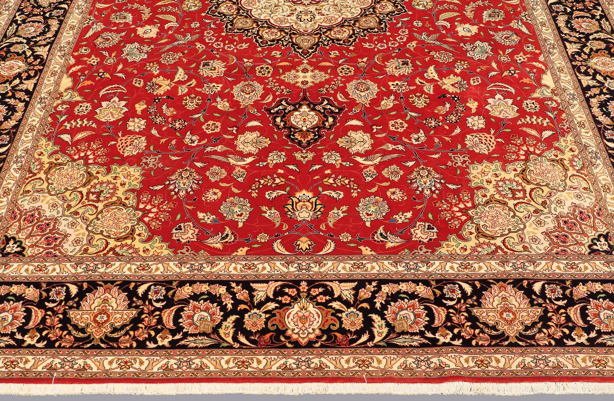 A carpet, Täbriz part silk, 341 x 248 cm.