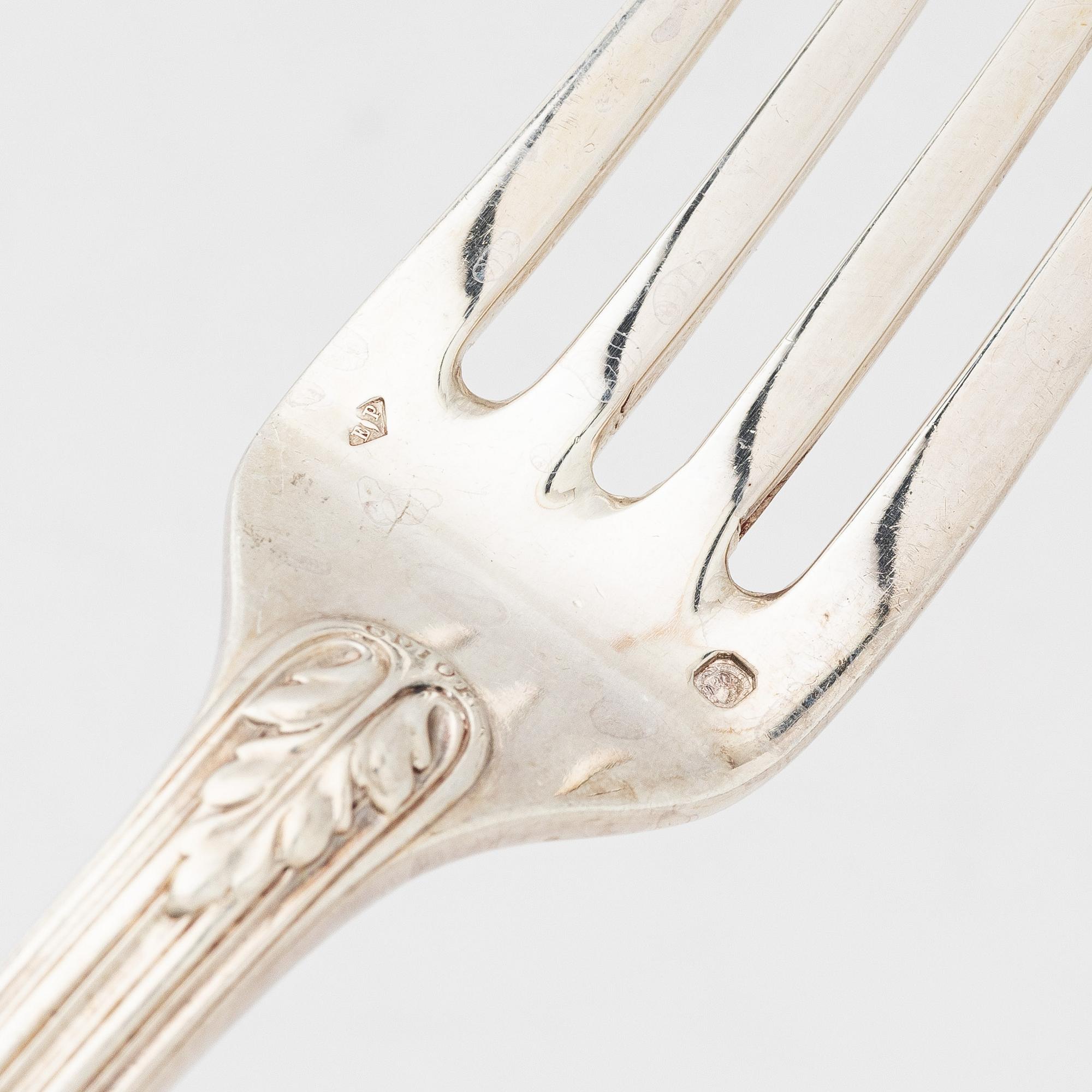 A silver cutlery set and wood case, mark of Émile Puiforcat and others, Paris, France 1850s-1900s.