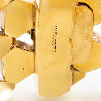 A bracelet 14K gold in two colours.