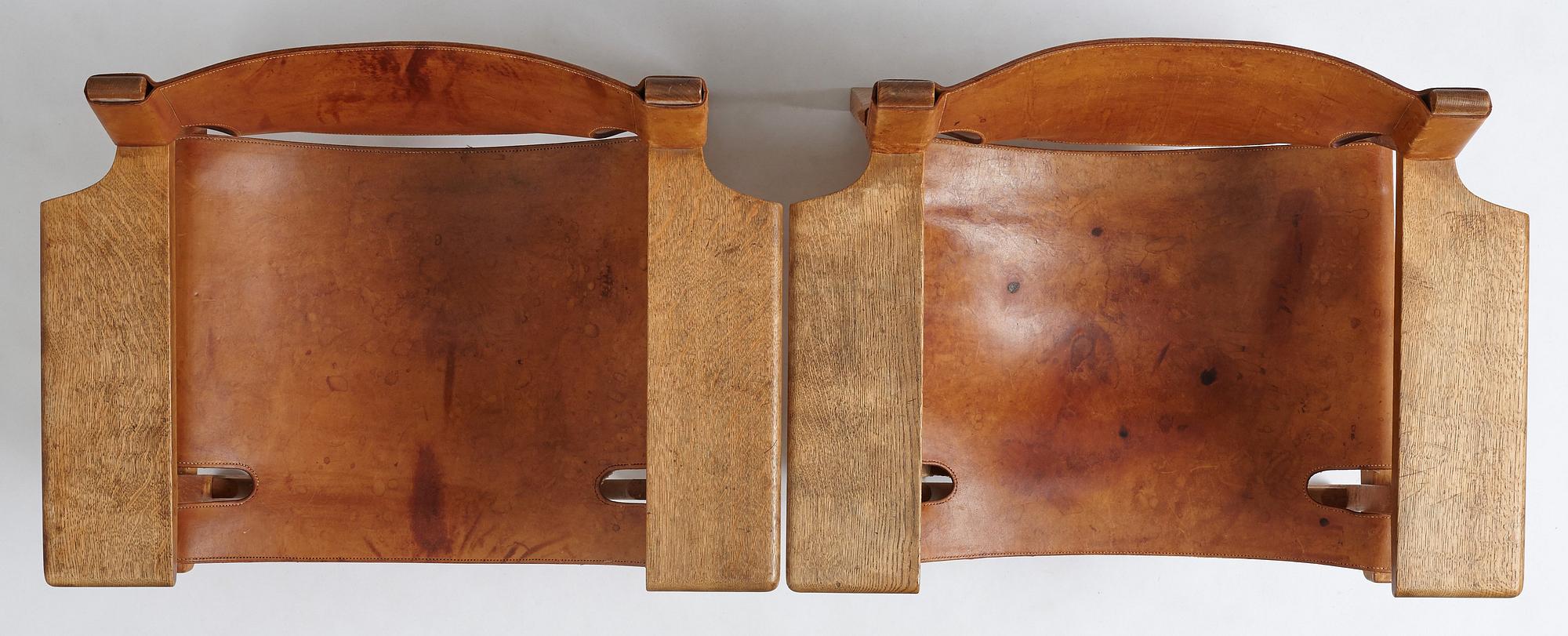 Børge Mogensen, a pair of oak and natural leather "Spanish Chair", model 226, Fredericia Stolefabrik, Denmark.