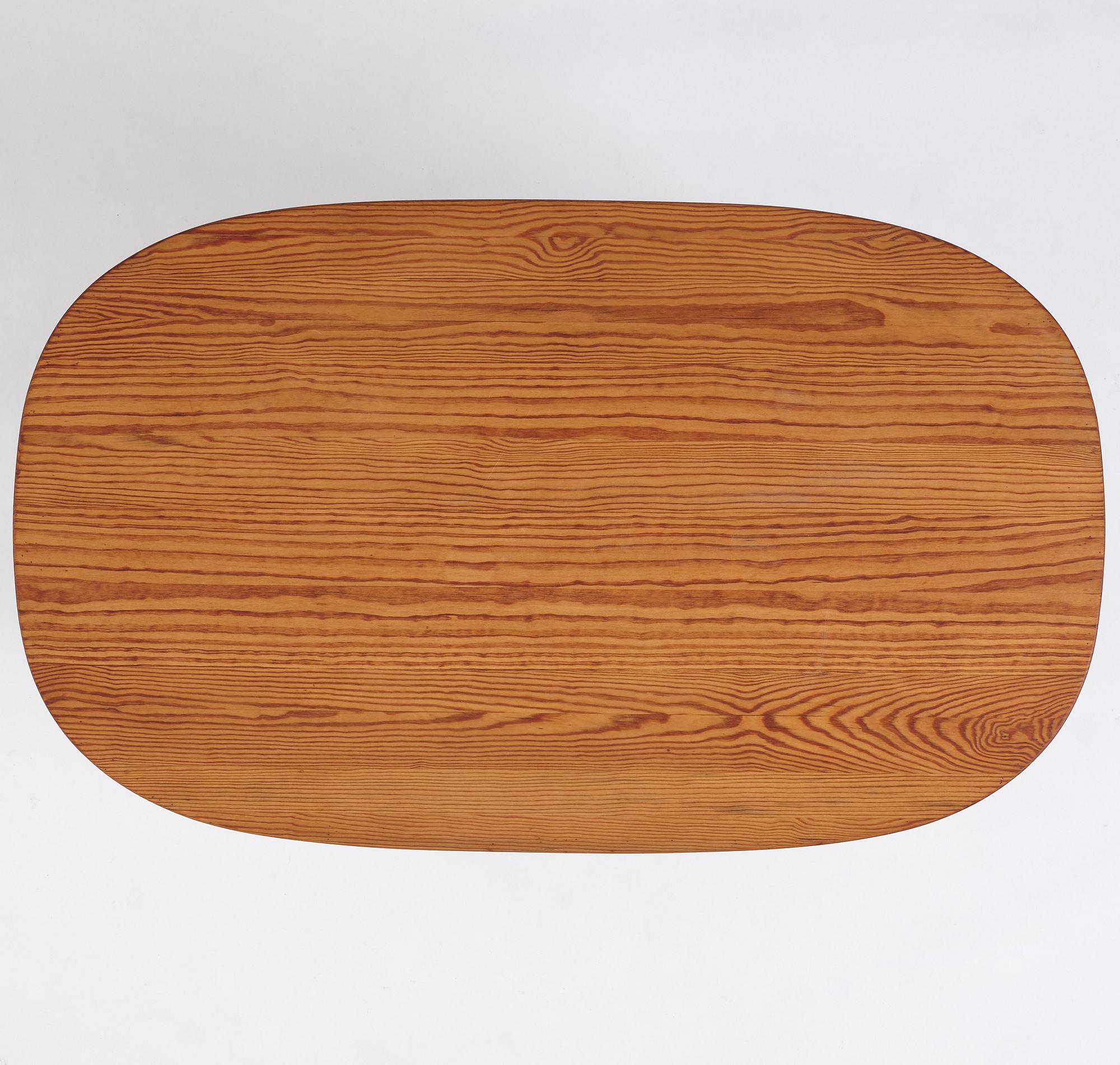 Carl Malmsten, a stained pine table, Sweden 1930's.