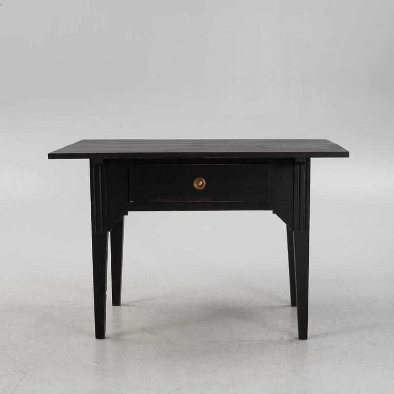 A table, late 19th Century.