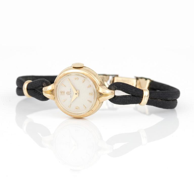 DAMARMBANDSUR, Omega, 1940-tal, boett 14 k guld.