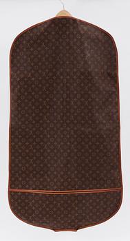 A monogram canvas wardrobe trunk by Louis Vuitton.