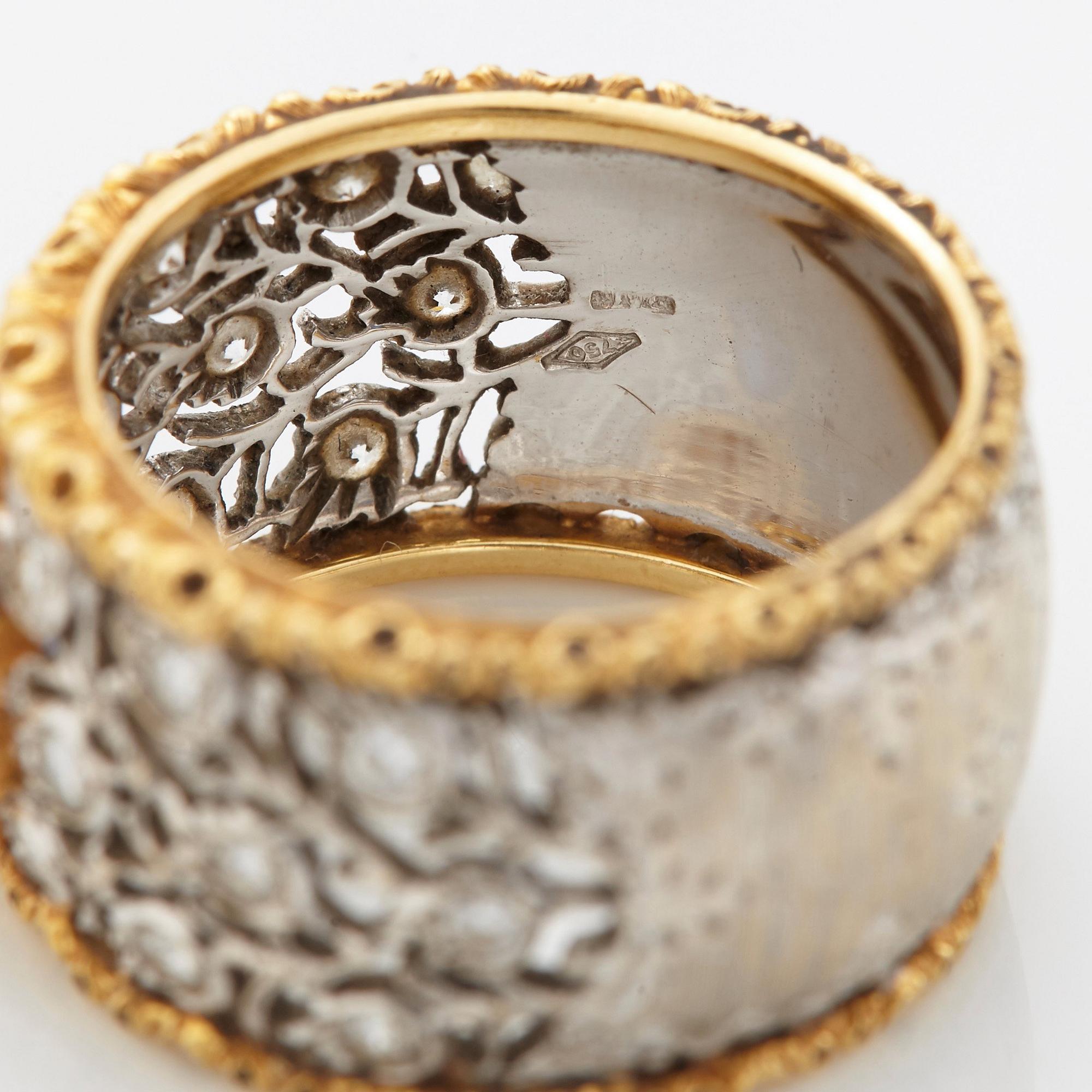 A Buccellati ring in 18K gold and white gold set with a faceted sapphire and round brilliant-cut diamonds.