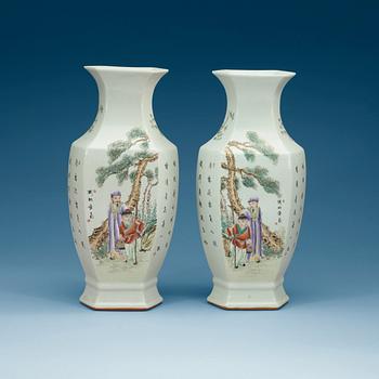 1663. A pair of Chinese famille rose vases, 20th Century.