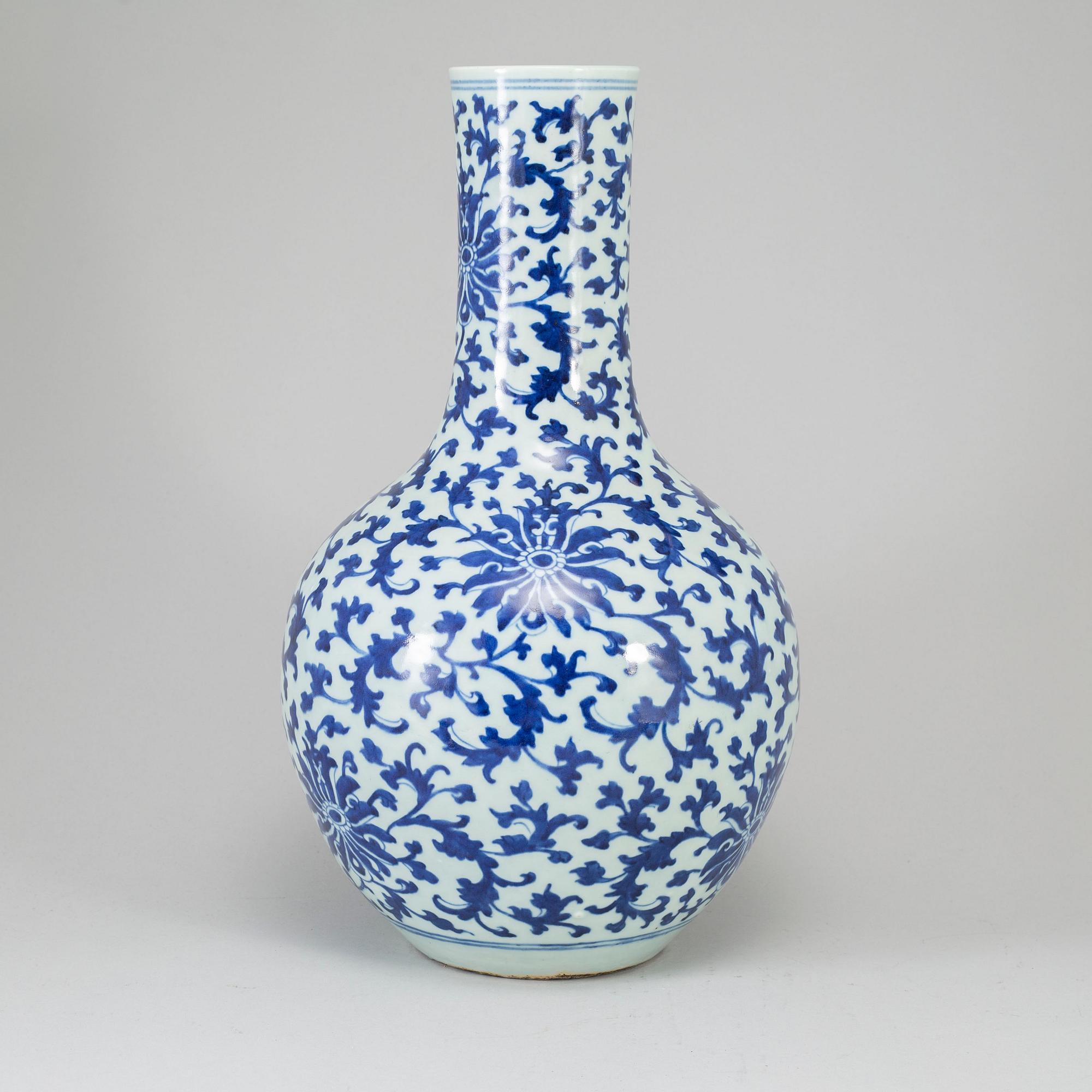 A blue and white lotus vase, presumably late Qing dynasty, circa 1900.