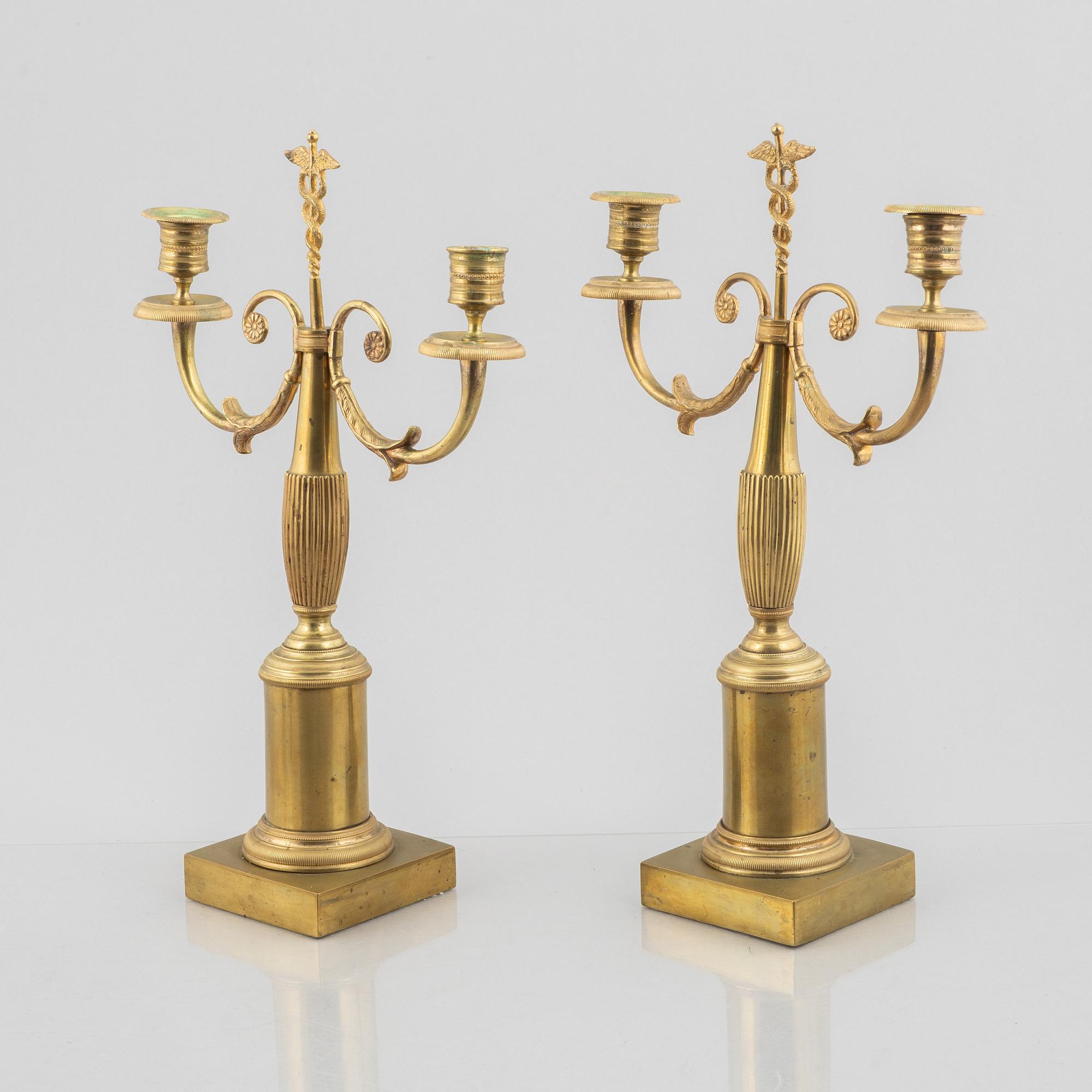 A pair of brass candelabra, first half/mid 19th century.