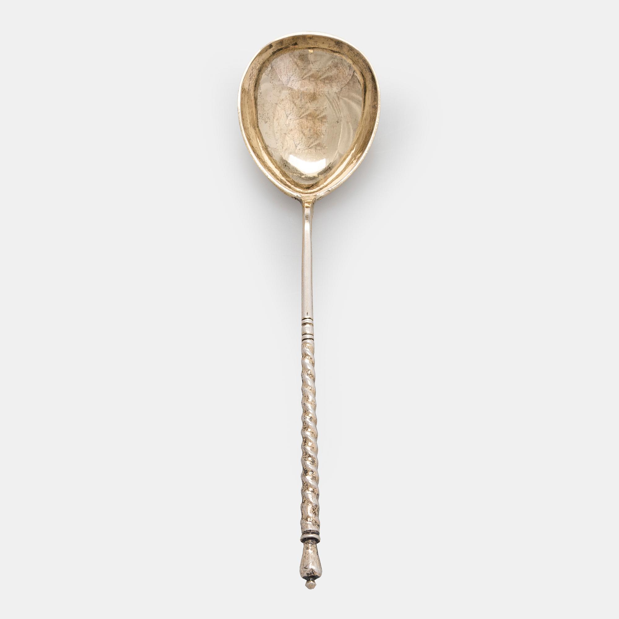 A parcel-gilt silver jam spoon, Moscow 1881.