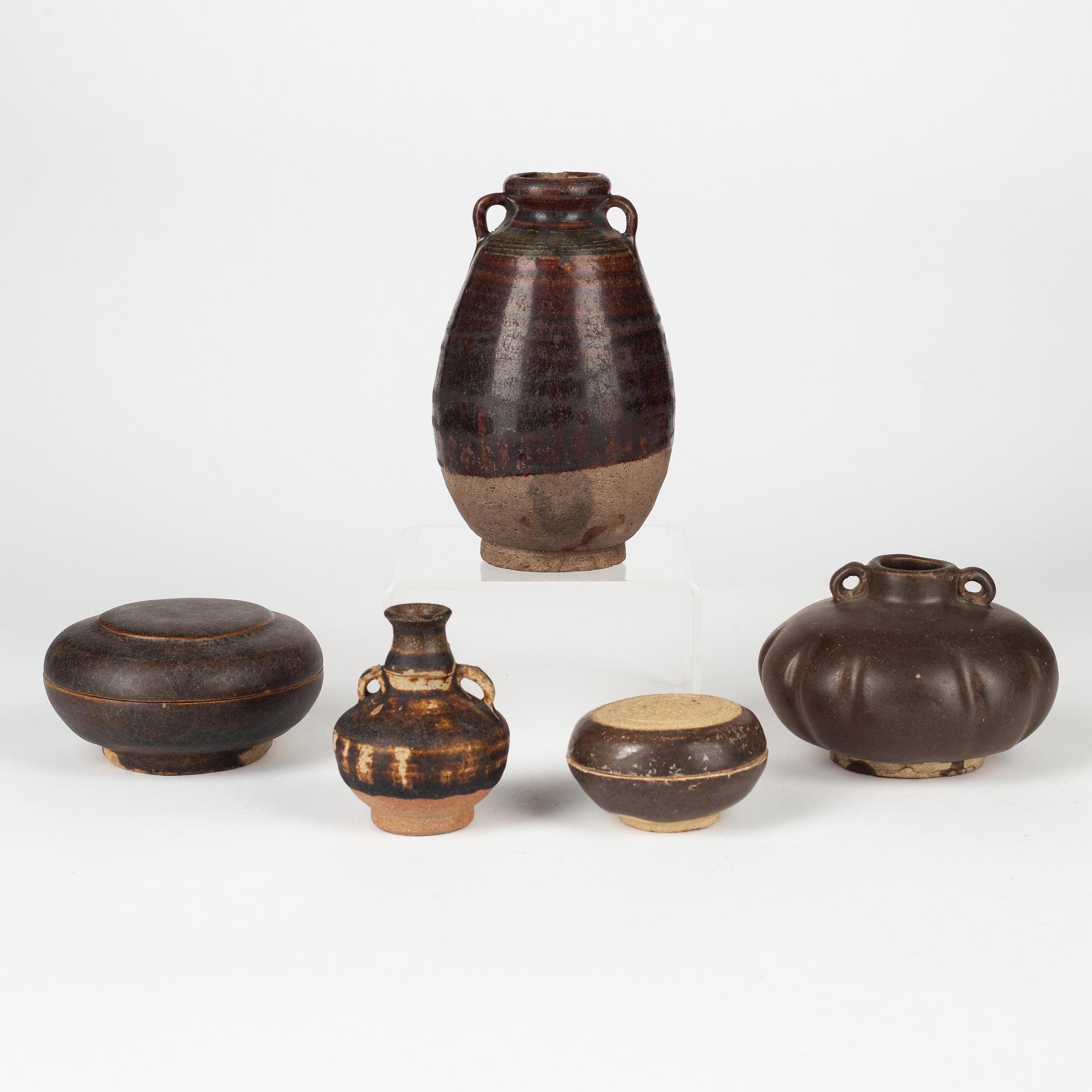 A group of brown glazed South East Asian potteries, 14th/17th Century.
