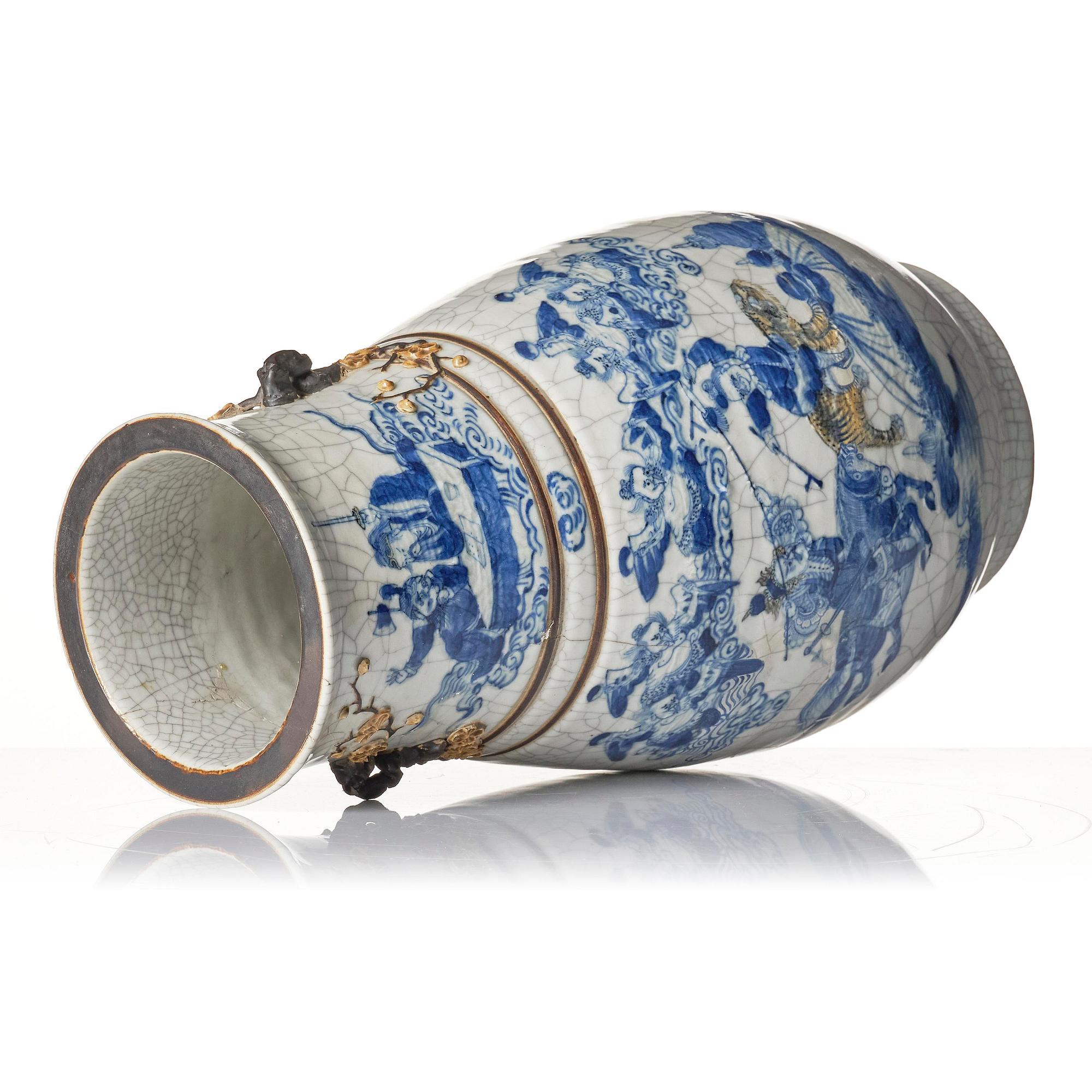 An underglaze blue and enamelled vase, Qing dynasty, 19th century.
