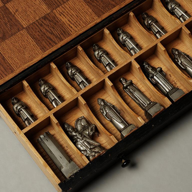 A set of 32 Tore Strindberg chess pieces, executed by Herman Bergman foundry, Stockholm.