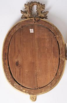 A pair of Gustavian giltwood two-branch girandole mirrors by J. Åkerblad (master in Stockholm 1758-99).