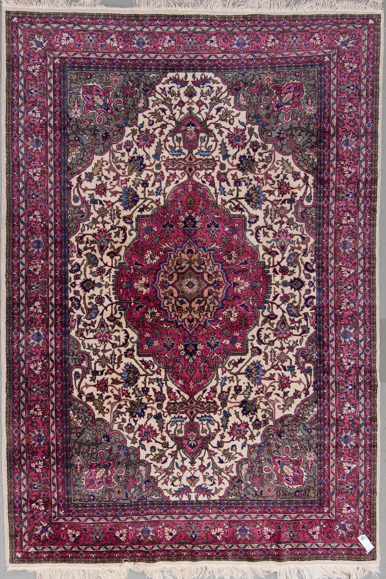 An eastern european carpet, around 294 x 205 cm.