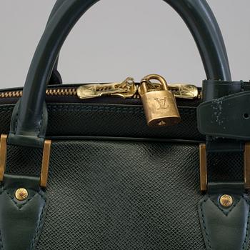 LOUIS VUITTON, a taiga leather 'Helanga' weekend bag.