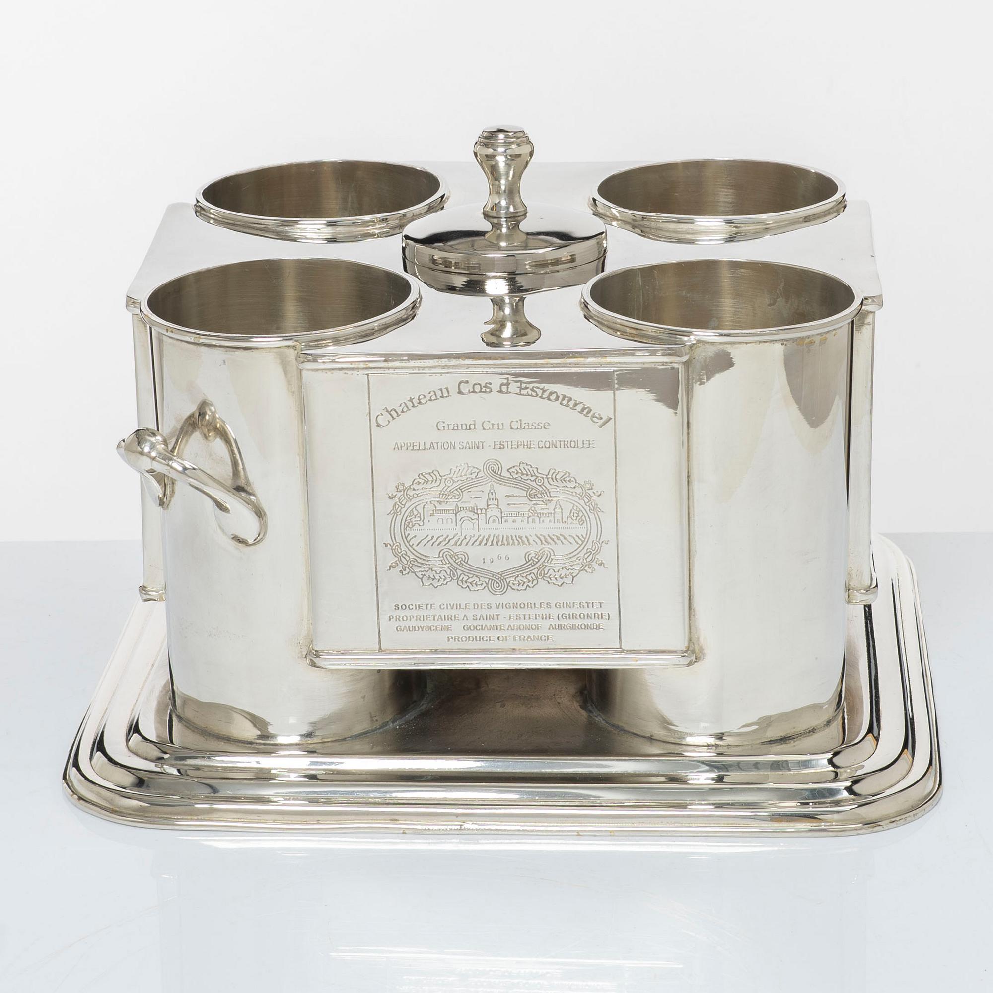 A silver plated four-bottle wine cooler.