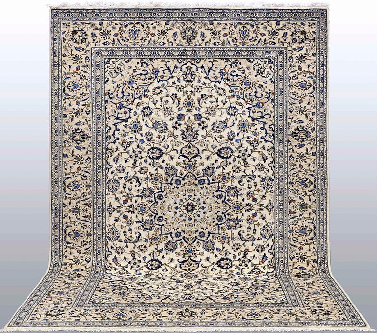 A carpet, Keshan, c. 353 x 241 cm.