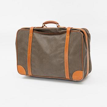 Mulberry, a scotch grain suitcase.