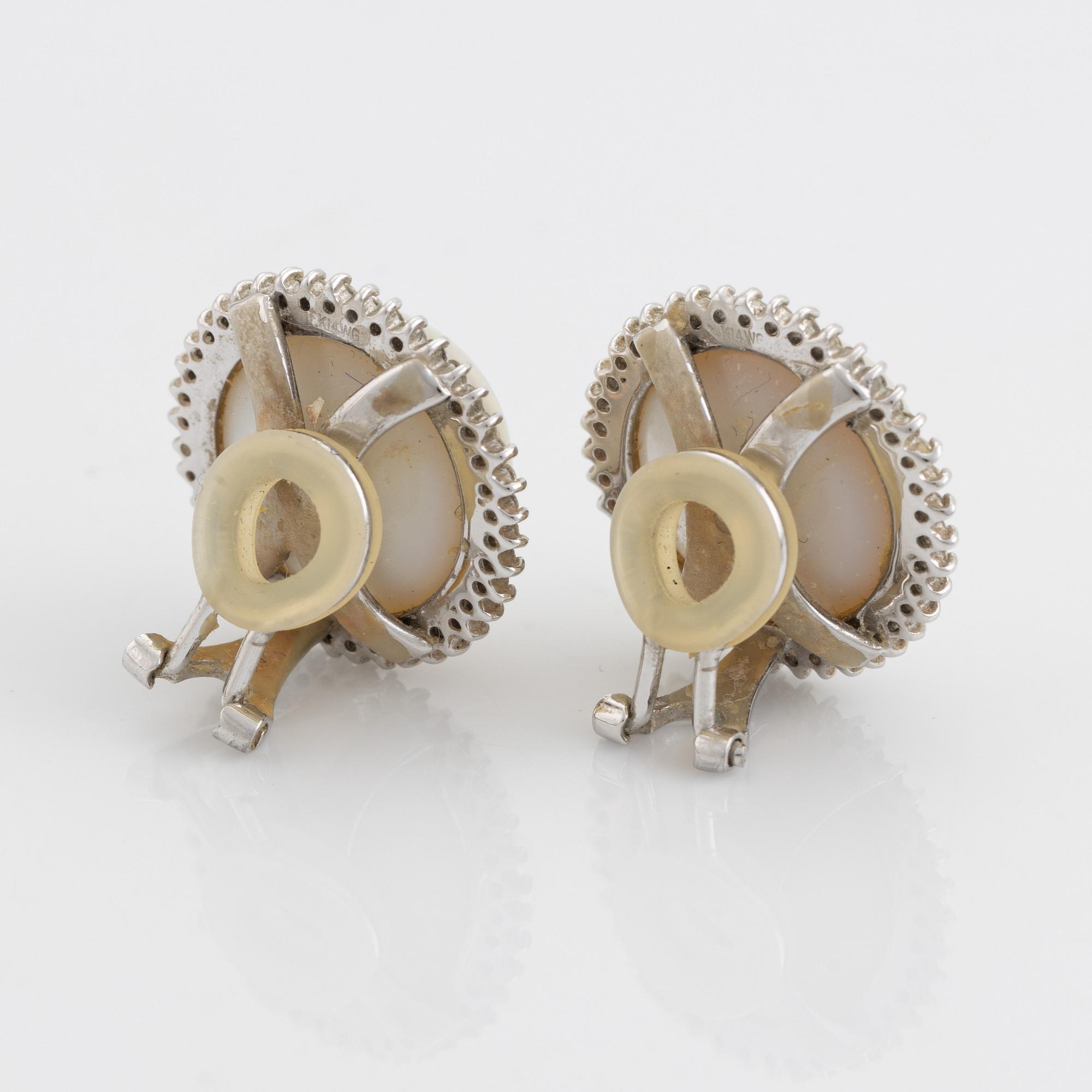 Mabe pearl and brilliant cut diamond earrings.