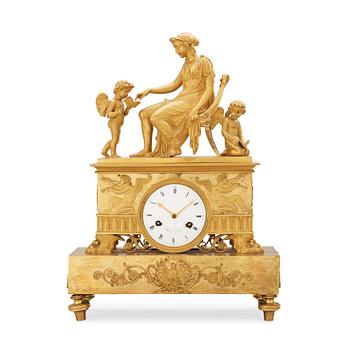 555. A French Empire early 19th century mantel clock, marked Thiery à Paris.