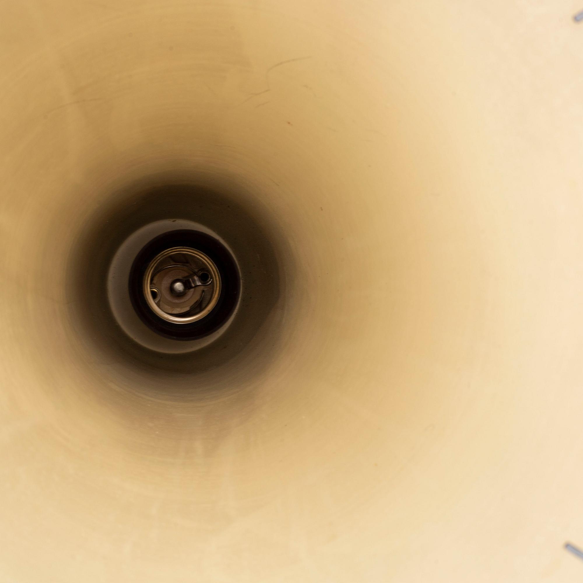 A pair of 1950s ceiling-lights.